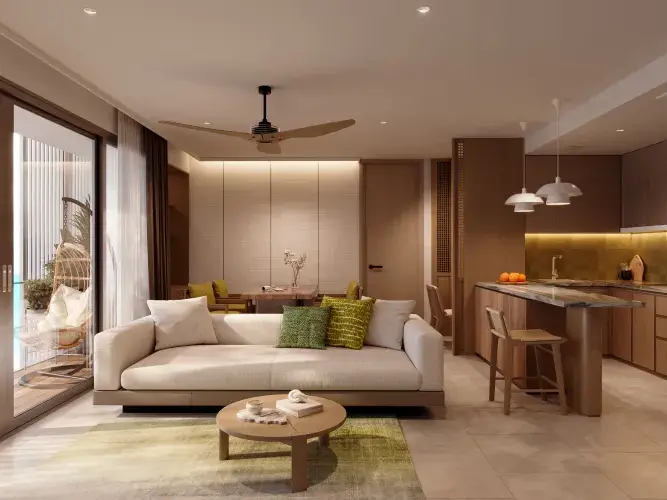 Living room with a cream sofa and sliding doors to a balcony